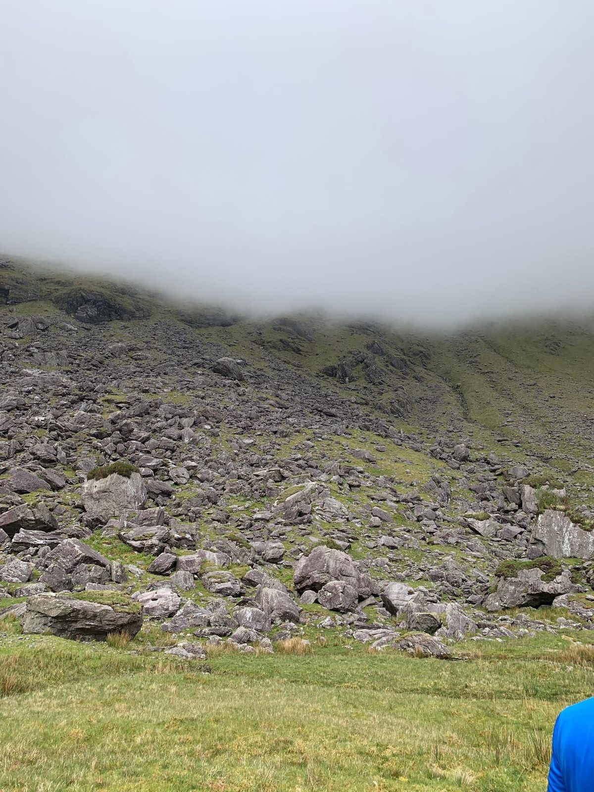 Loose rock and scree rising into cloud in the Black Ladder