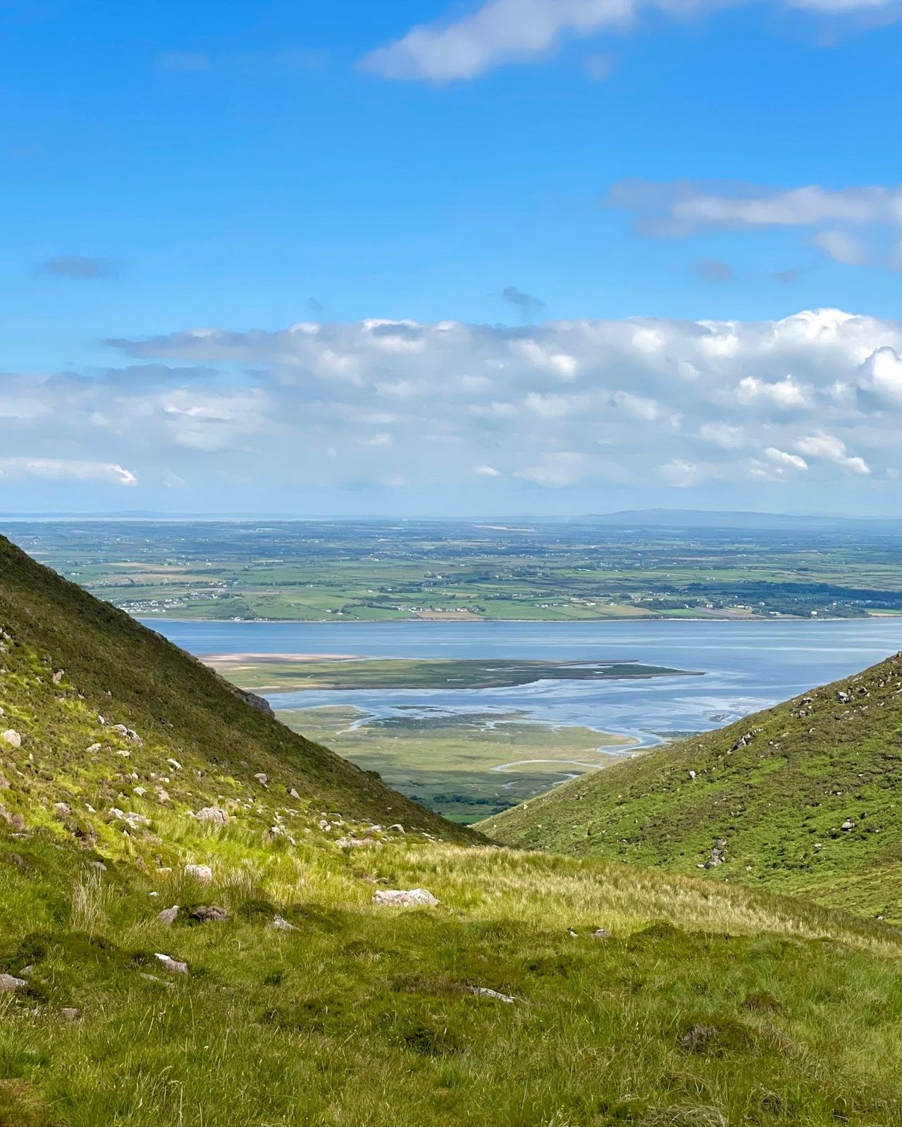 A high view through the glen towards Tralee Bay and the north Kerry coast