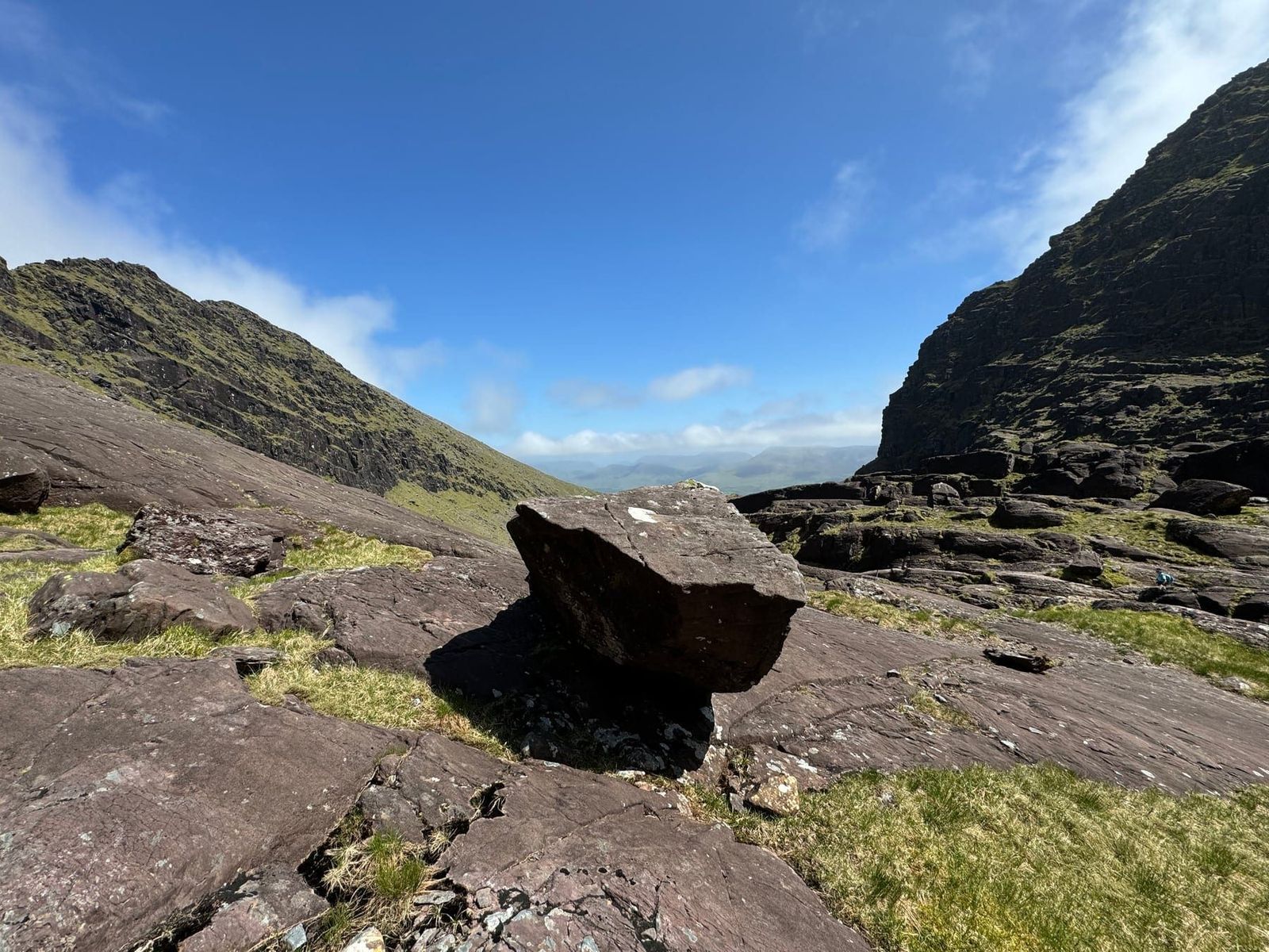 A large angular boulder on the floor of the rocky Faha corrie